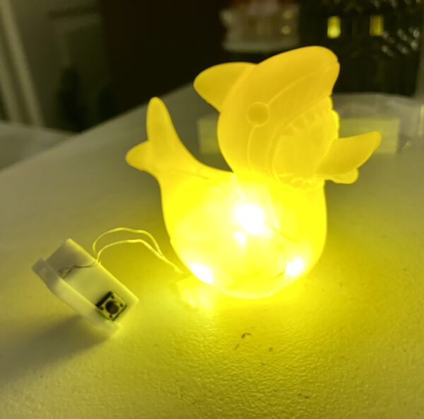 Duck dressed in shark costume nightlight